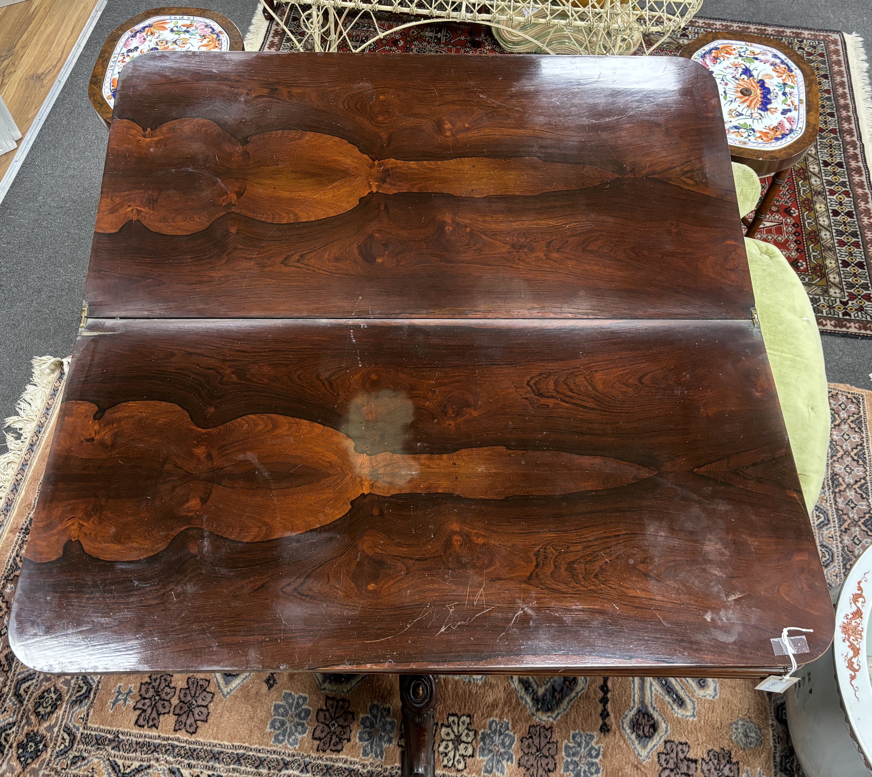 A Victorian rectangular rosewood folding tea table, width 99cm, depth 49cm, height 77cm